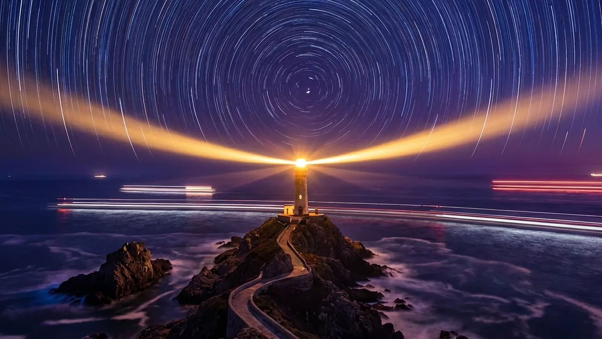 Long exposure drone photography showing light trails and smooth water effects