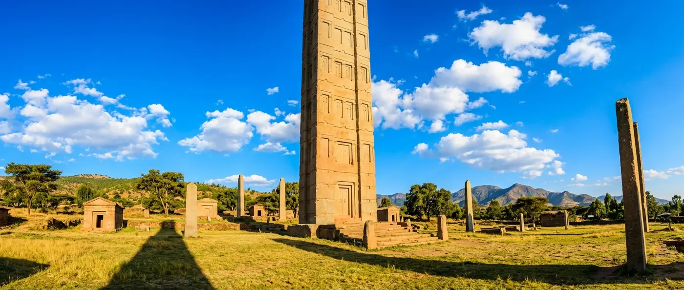 Massive granite obelisks towering over Axum archaeological site in Ethiopia